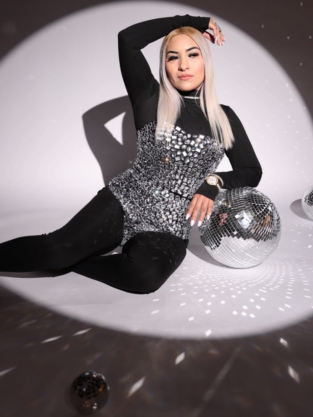Silver Sequin Bustier Top over Black Long Sleeve